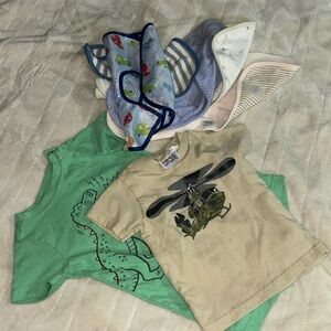 One onesie and shirt for baby + extra bibs and cloth for baby